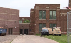 Detroit roofer dies after falling through the roof of a school.