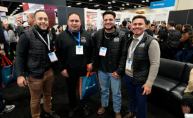 A group of Latino men at the 2025 International Roofing Expo